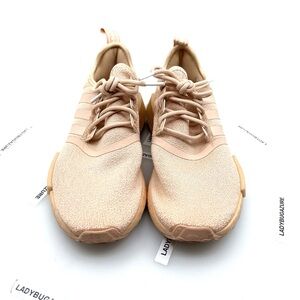 Like New Adidas NMD_R1 sneakers in the "Halo Blush" colorway. Size 7